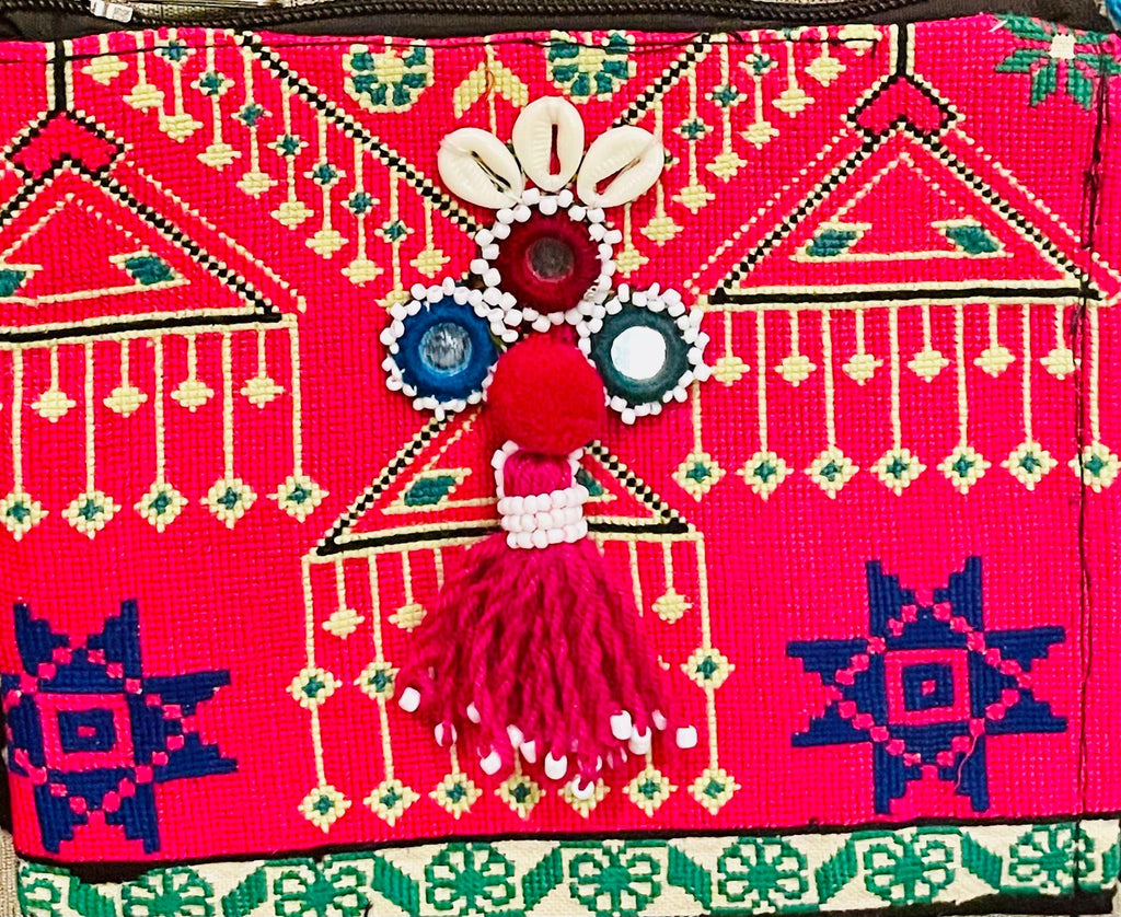 Hand- embroidered purse