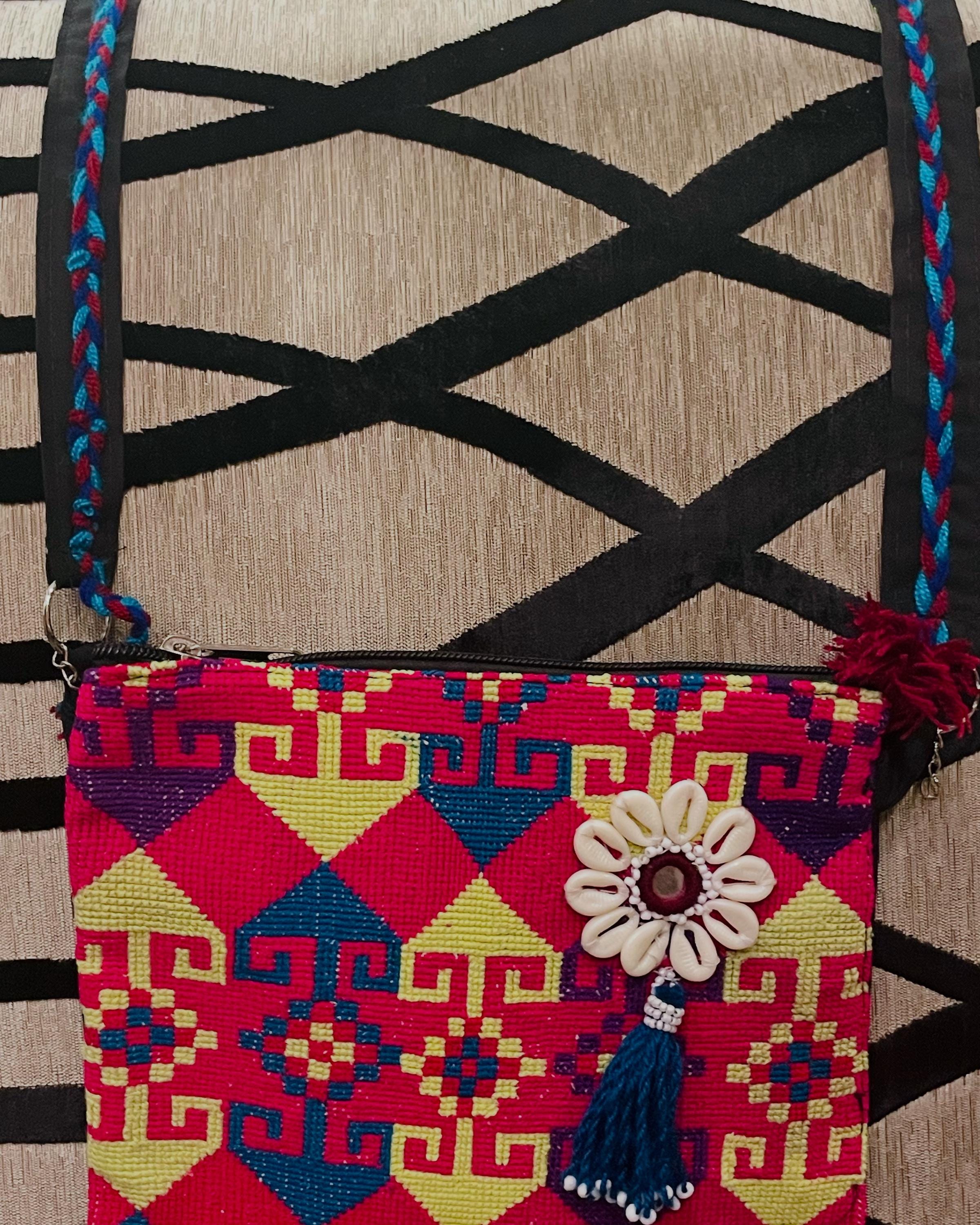 Hand- embroidered purse